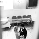 having a quiet moment as bride and groom at the guildhall bury st Edmunds